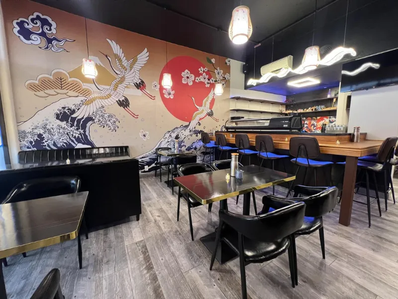 Chic left dining area with traditional Japanese art at Miyazaki Sushi & IZAKAYA, a Japanese Restaurant in Kailua-Kona.
